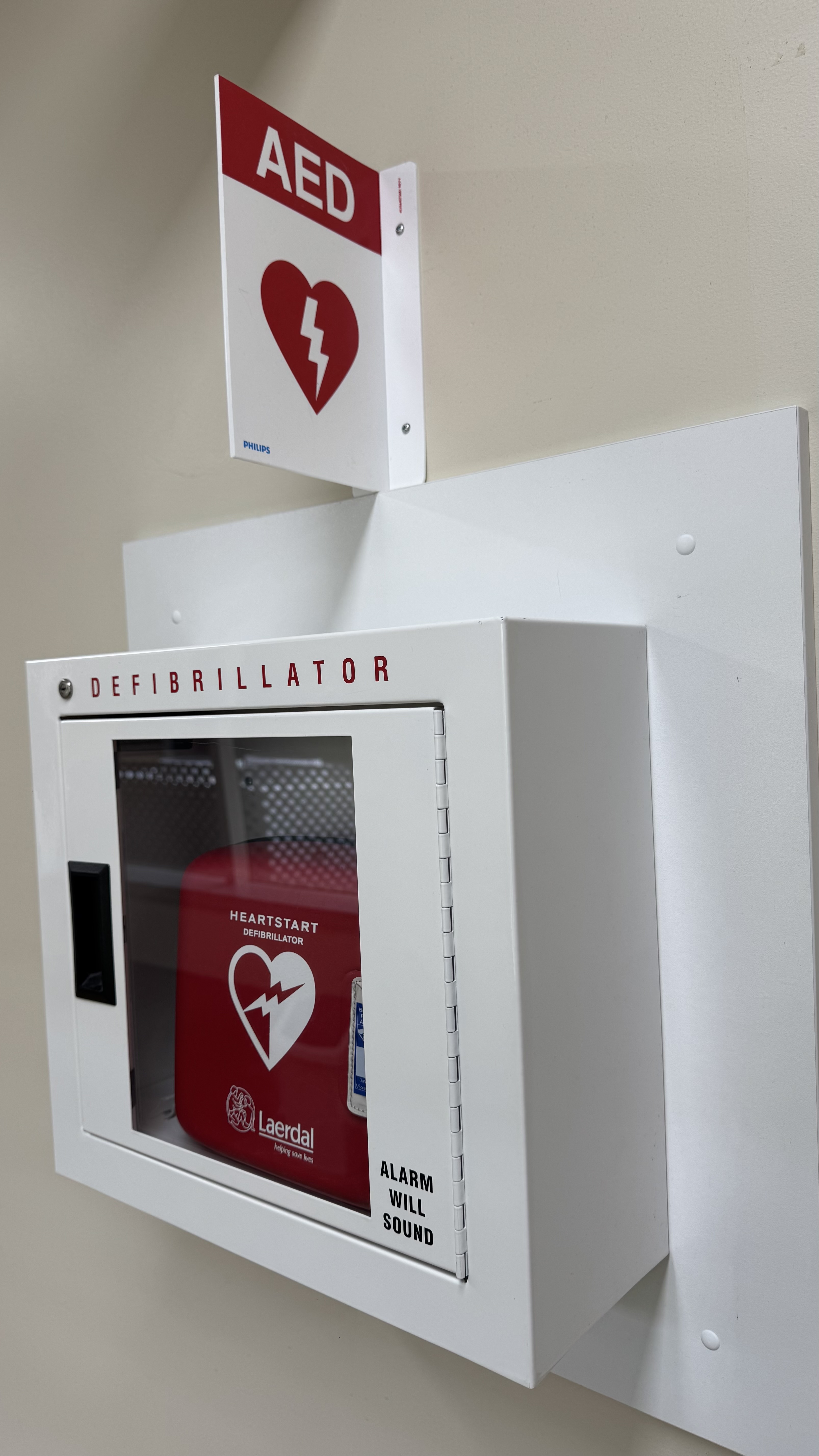 Automated external defibrillator cabinet